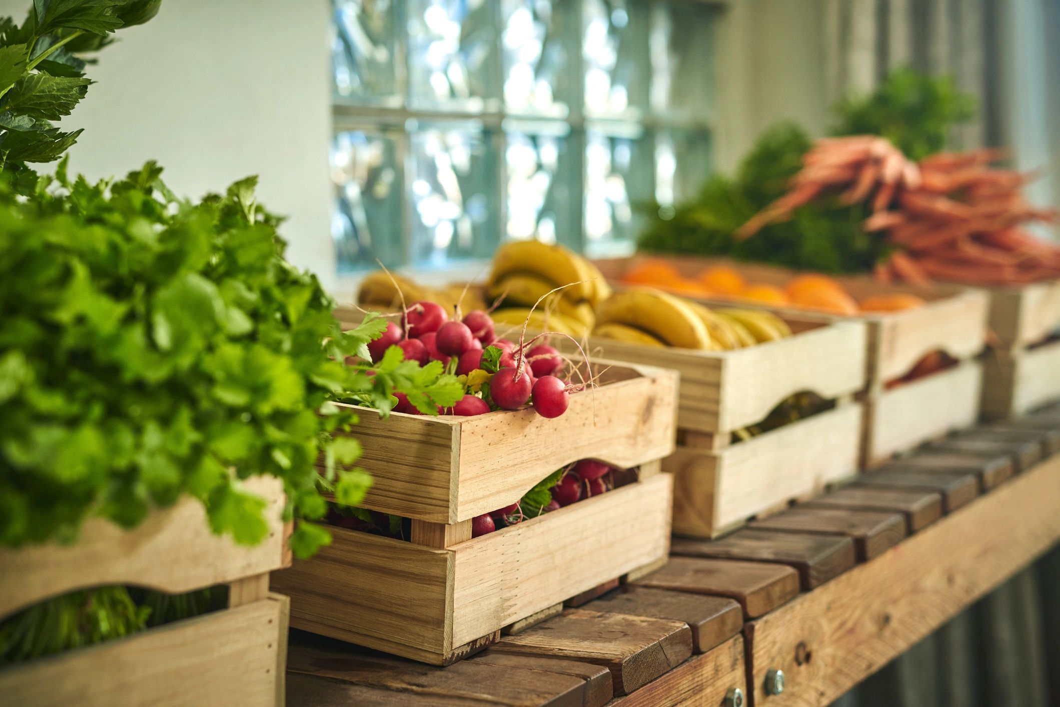 Crate of freshly picked produce at a market